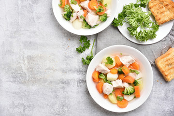 Chicken soup with carrot, broccoli, potato