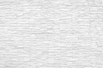Naklejka premium Rock stone brick tile wall aged texture detailed pattern background in cream beige brown color