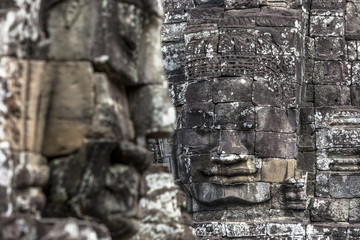 Fototapeta na wymiar Bayon temple smiling buddha face Angkor Wat Siem Reap Cambodia South East Asia travel
