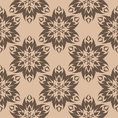 Brown floral ornament on beige background. Seamless pattern