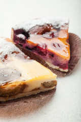 Pieces of sweet fruit pies with a jelly layer.