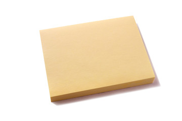 Yellow oblong sticky post it note pad isolated on white background photo