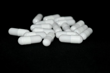 Tablets in capsules, means for treatment.
