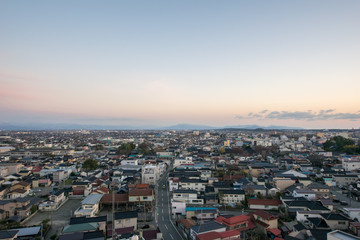酒田市街から見る夕暮れの鳥海山（庄内平野）