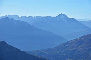 Silhouette of mountains in the European Alps in cold blue light. Hoher Riffler, Austria.