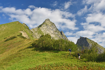 Fototapeta na wymiar Hiker at the Hoefats mountain in the Allgaeu Alps. Bavaia, Germany