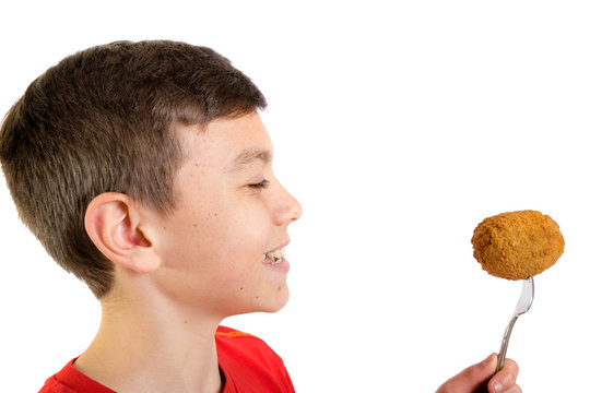 Young Caucasian Teenage Boy With A Scotch Egg