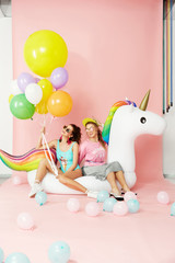 Summer Fun. Happy Women Friends In Fashion Clothes With Balloons