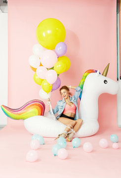 Fashion Woman In Summer Clothes Having Fun With Balloons
