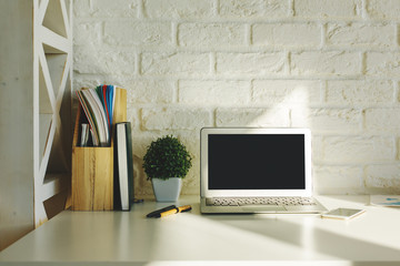 Creative hipster workplace with laptop