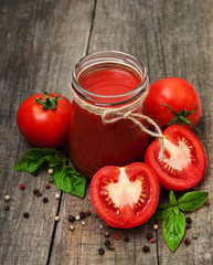 Jars with tomato juice