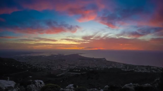 Fantastic aerial view of city illuminated with lights. Location Trapani, Erice, Sicilia, Italy, sightseeing Europe. Time lapse clip.