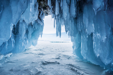 Winter Landscape, Frozen ice cave with bright sunlight from way out at lake Baikal in Irkutsk,...