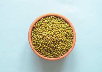 Mung bean in a wooden bowl. The concept of healthy and beneficial food.
