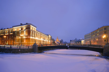 View of the Potseluev Bridge in January twilight. Saint Petersburg, Russia