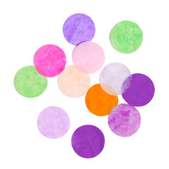 Assortment of colorful confetti on white