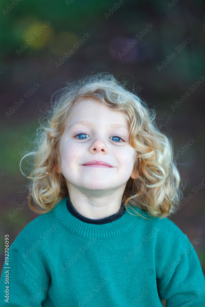 Wall mural Small child enjoying of a sunny day