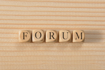 Forum word on wooden cubes. Forum concept