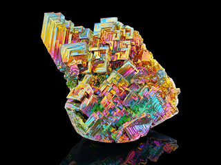 Amazing colorful rainbow Bismuth Gemstone mineral macro closeup isolated on black background