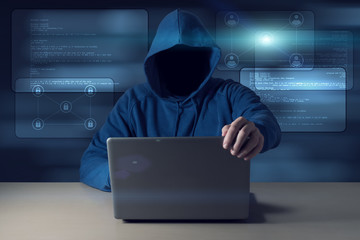 Computer hacker steals data from laptop. Theft of personal data and computer crimes