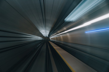 blurred motion effect background under subway tunnel - 192711432