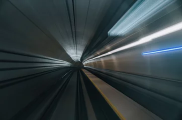 Poster de jardin Tunnel blurred motion effect background under subway tunnel  © amirul syaidi