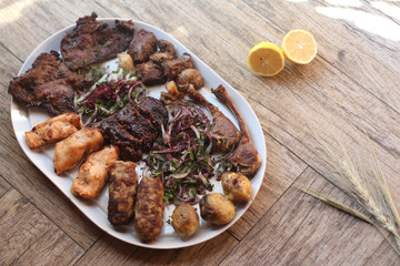 Different types of a kabab on a wooden background