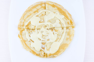 Pancakes drenched with condensed milk