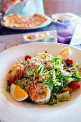 Caesar salad with grilled shrimps