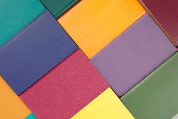 pile of multicoloured books, bunch of multicolored books, heap of books, backgrounds is out of multi-colored books, textured background