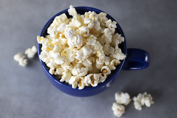 Popcorn on gray background.