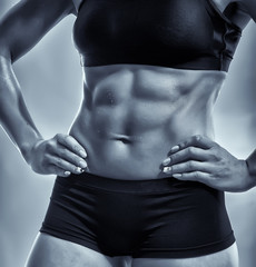 Fototapeta premium Anonymous athletic woman