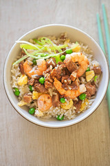 Fried rice with char sui pork, prawns, egg and vegetables with sesame oil 