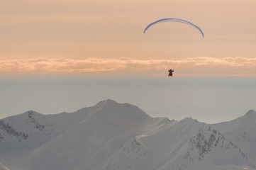 Portrait of a man flying on a parachute