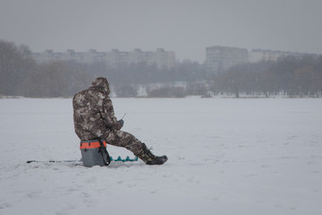 Winter fishing at sea. Tents, snow, sea.