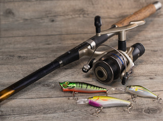 fishing tackle on a wooden table