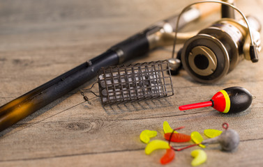 fishing tackle on a wooden table