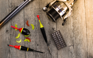 fishing tackle on a wooden table