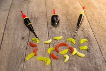 fishing tackle on a wooden table