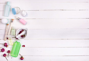 Skin care set on a white wooden background