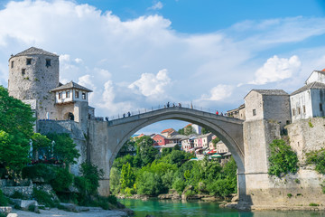 Fototapeta na wymiar In the city of Mostar there is an ancient bridge for pedestrians.