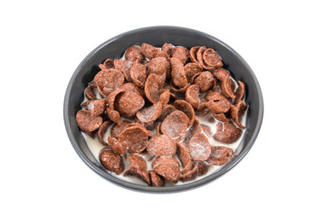 Cornflakes with milk in bowl isolated on white background