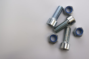 Hexagon Screws and nuts on white background