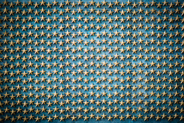 Golden stars on the blue background, symbol of American freedom