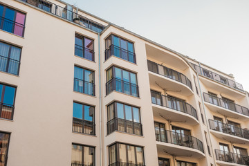 Obraz premium modern facade of real estate house with steel balcony