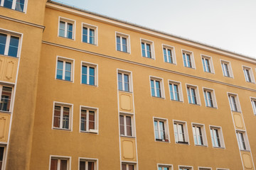 Fototapeta na wymiar brown apartment building in berlin