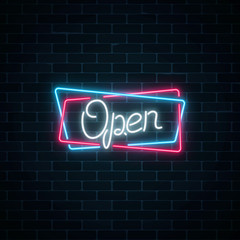 Obraz premium Neon open hand drawn sign in geometric shapes on a brick wall background.