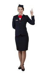 stewardess in full growth on a white background stands and shows the index finger up