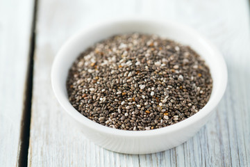 chia seeds on wooden surface