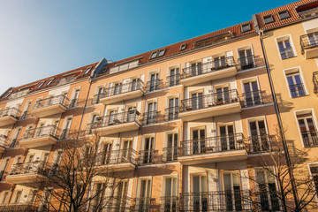 Fototapeta premium orange and beautiful apartment complex on a sunny day
